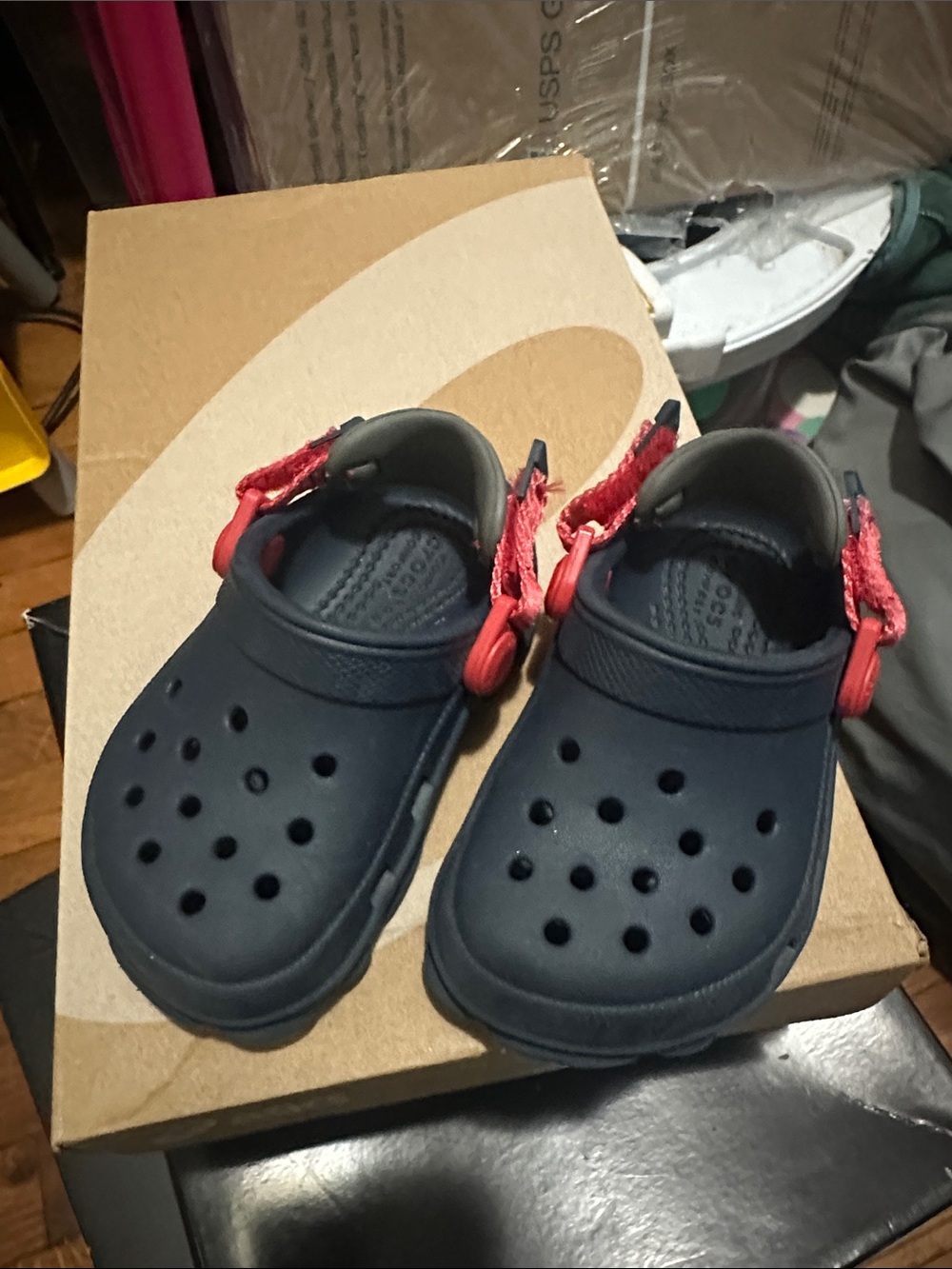 CROCS Kids Navy Blue Clogs with Red Heel Strap